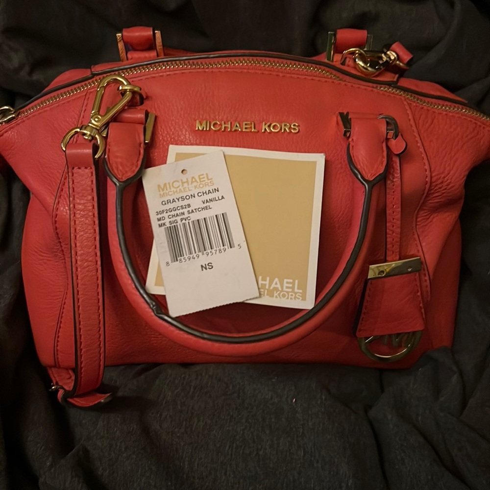 Originally $348.00 MK coral pink xbody satchel!